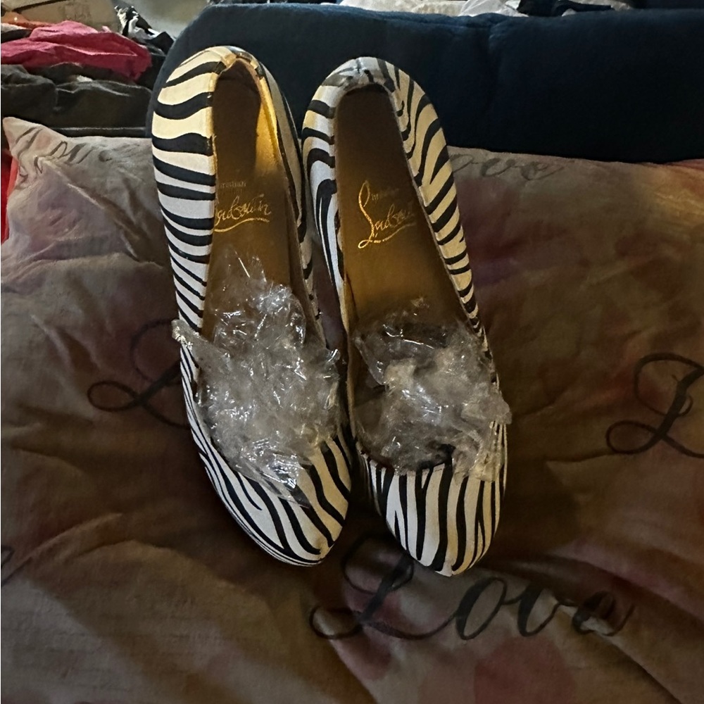 Zebra print red bottoms